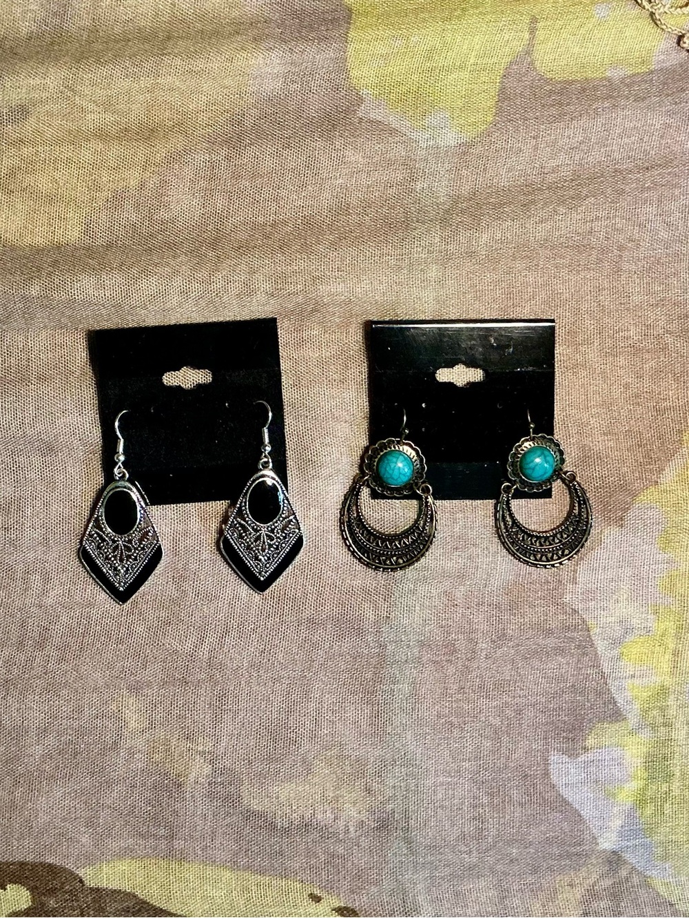 Gold/ bronze-Tone Turquoise Accent drop Earrings and a silver tone with black.